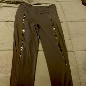 Black Lululemon womens leggings with black stripe